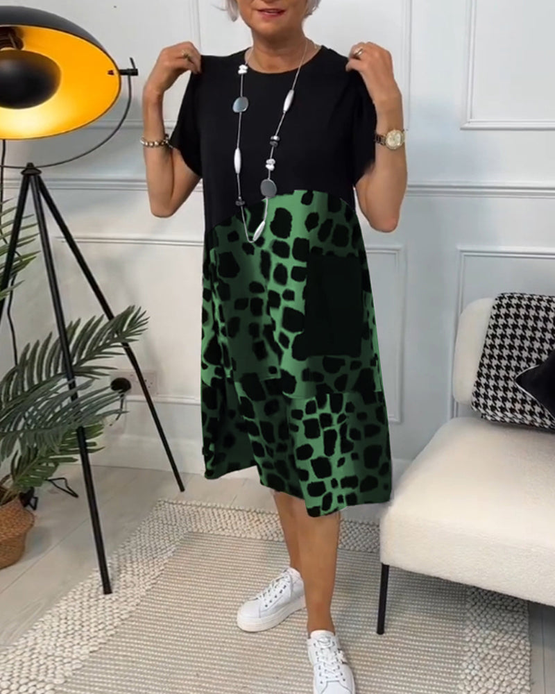 LP | Elegante abito midi a maniche corte con stampa leopardata