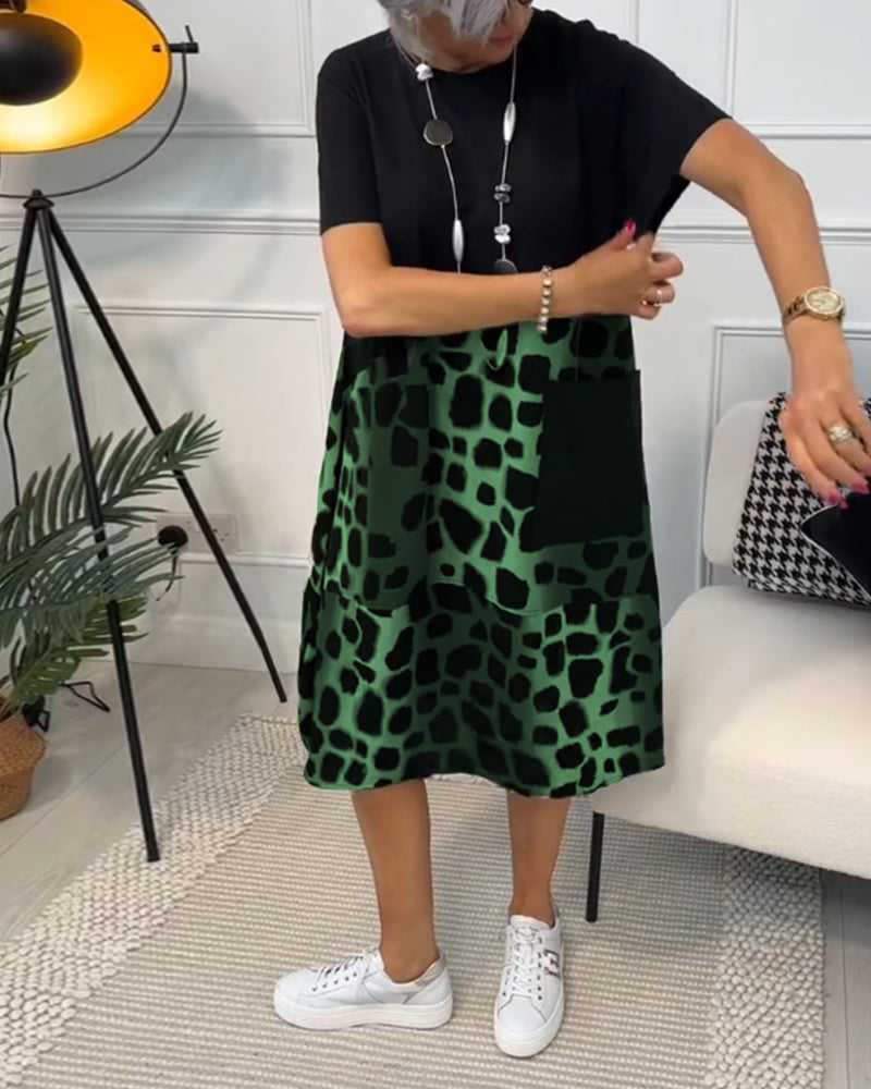 LP | Elegante abito midi a maniche corte con stampa leopardata