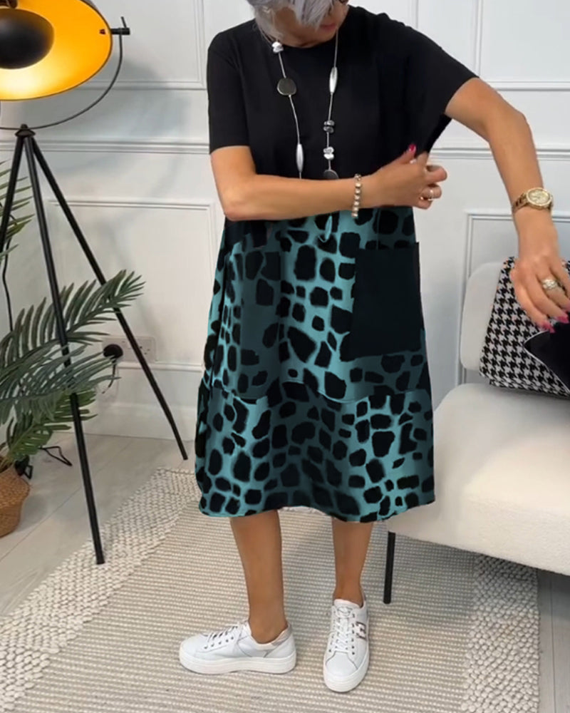 LP | Elegante abito midi a maniche corte con stampa leopardata