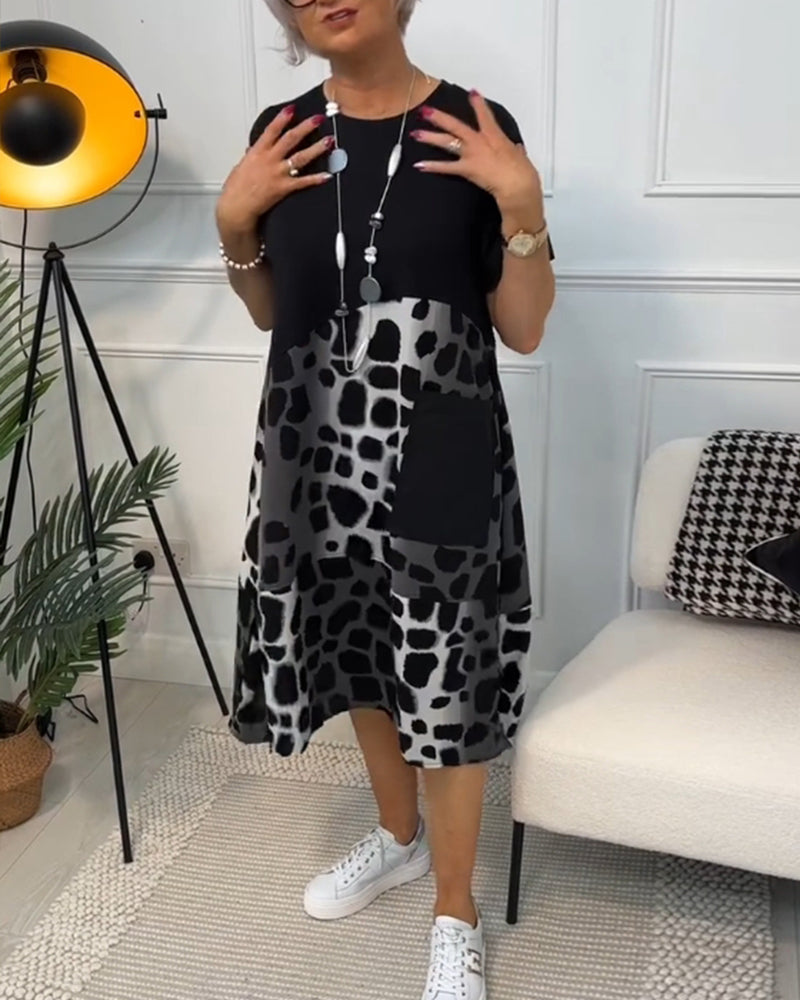 LP | Elegante abito midi a maniche corte con stampa leopardata