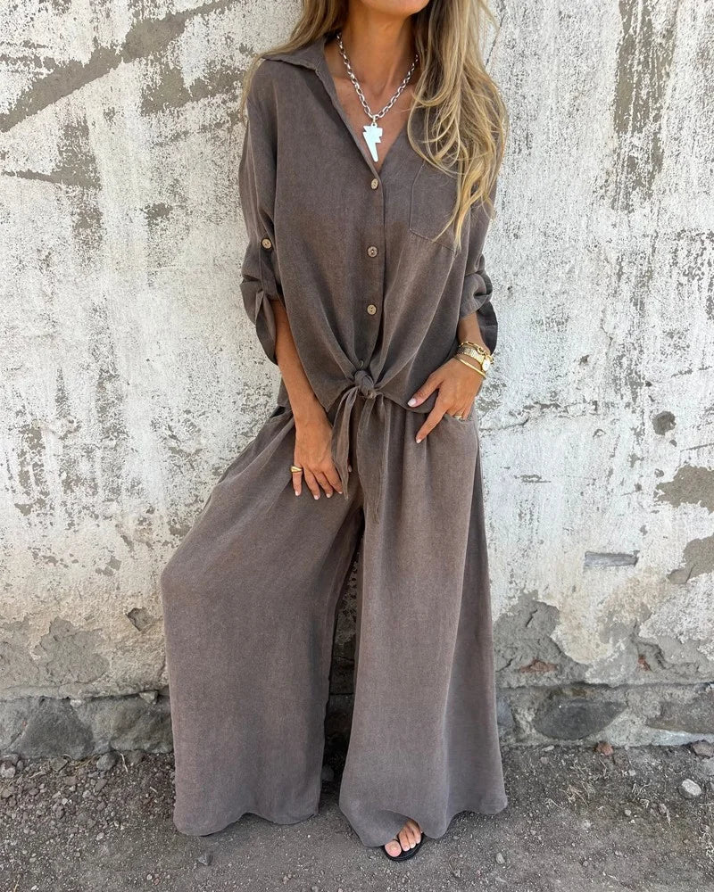 LP | Elegante outfit estivo da donna con pantaloni larghi e camicetta a maniche lunghe button-up