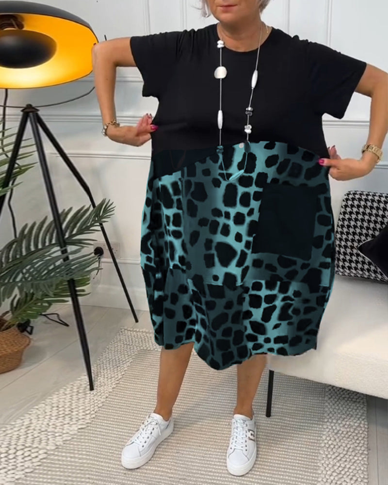 LP | Elegante abito midi a maniche corte con stampa leopardata