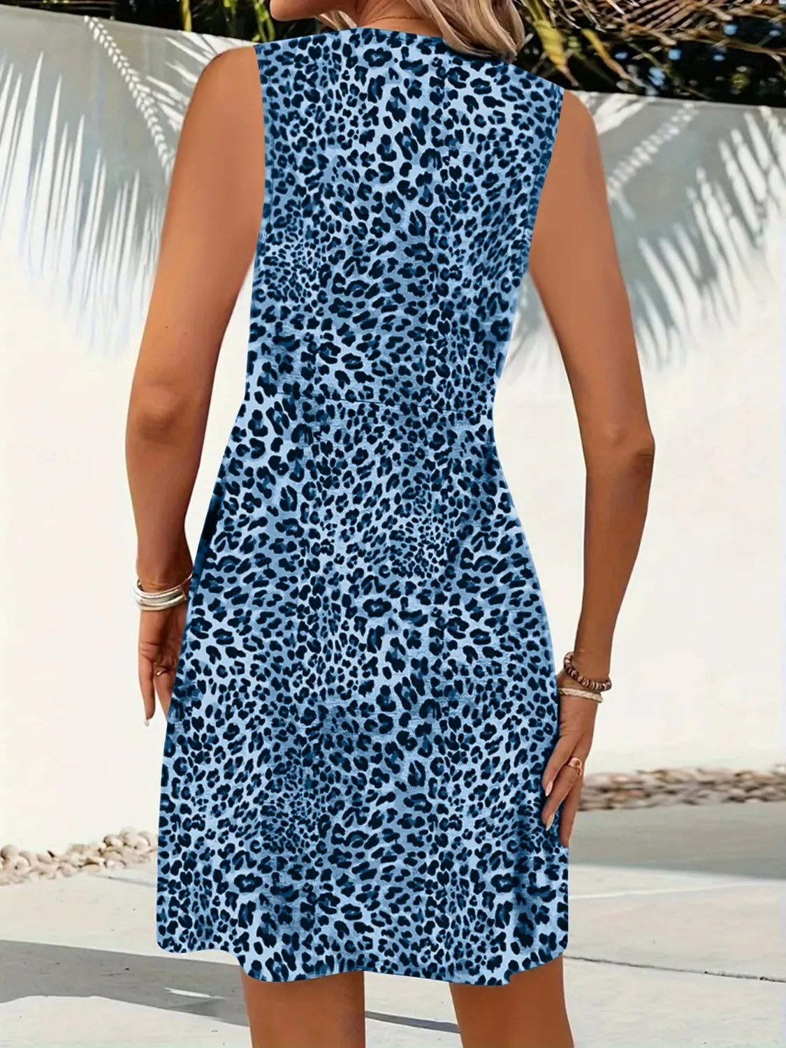 LP | Mini abito senza maniche con scollo a V in leopardo