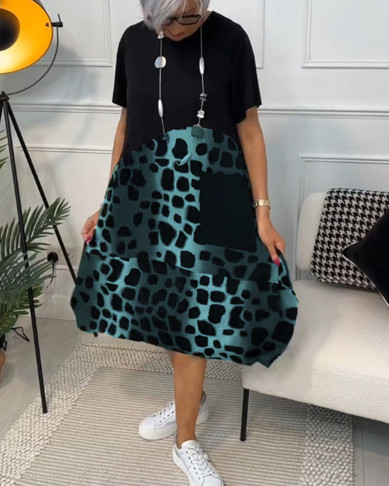LP | Elegante abito midi a maniche corte con stampa leopardata