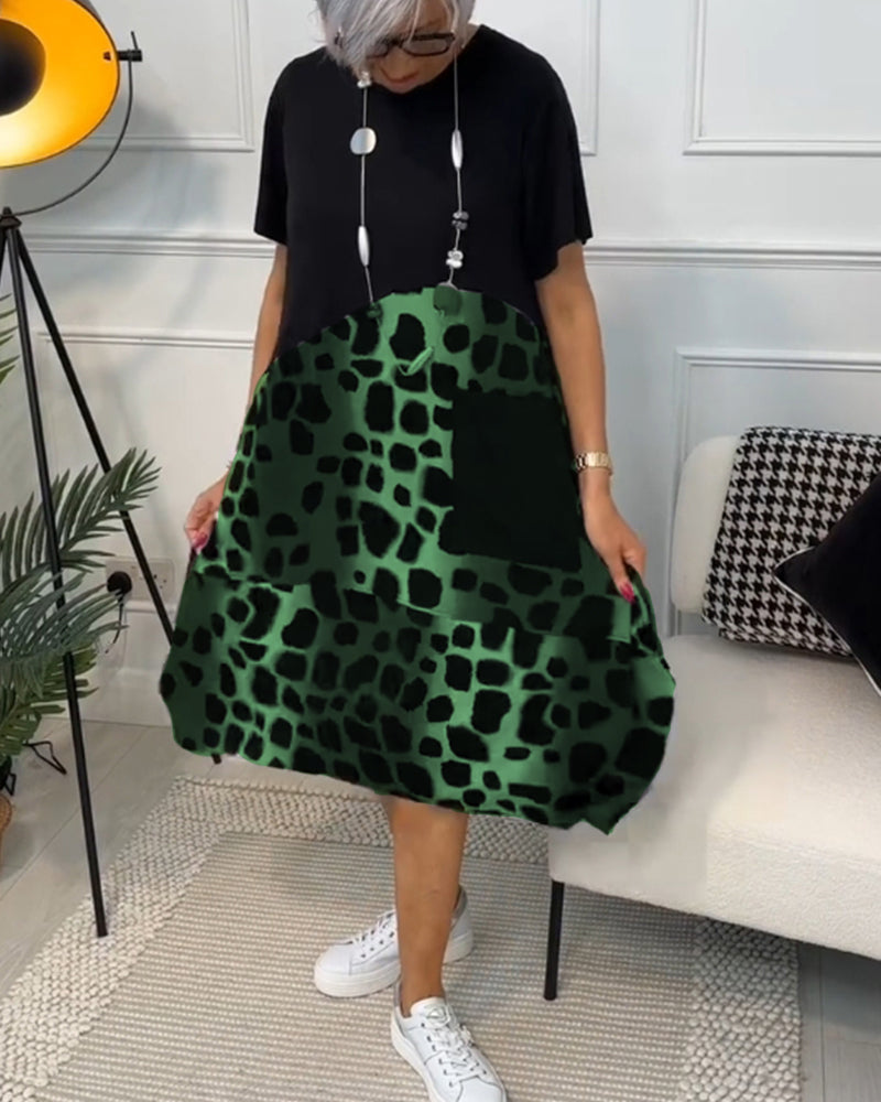 LP | Elegante abito midi a maniche corte con stampa leopardata