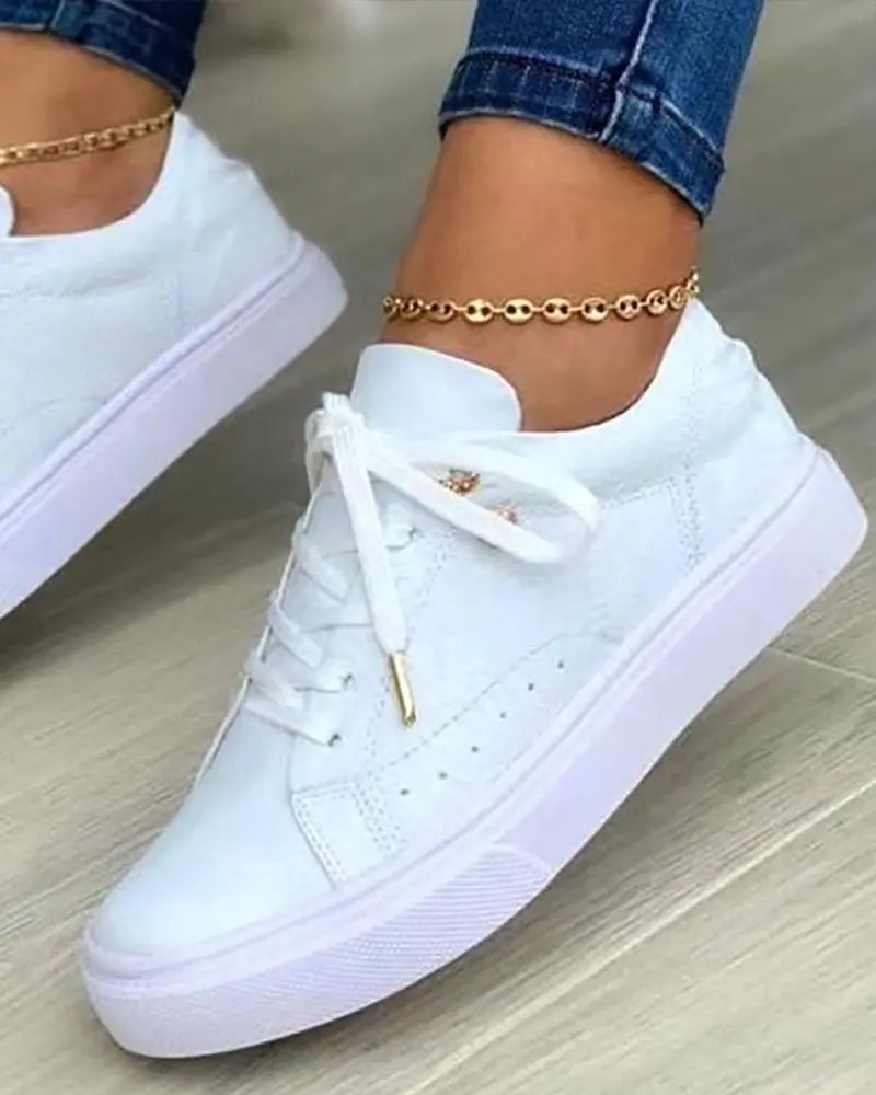 LP | Scarpe da ginnastica chic con dettagli in oro