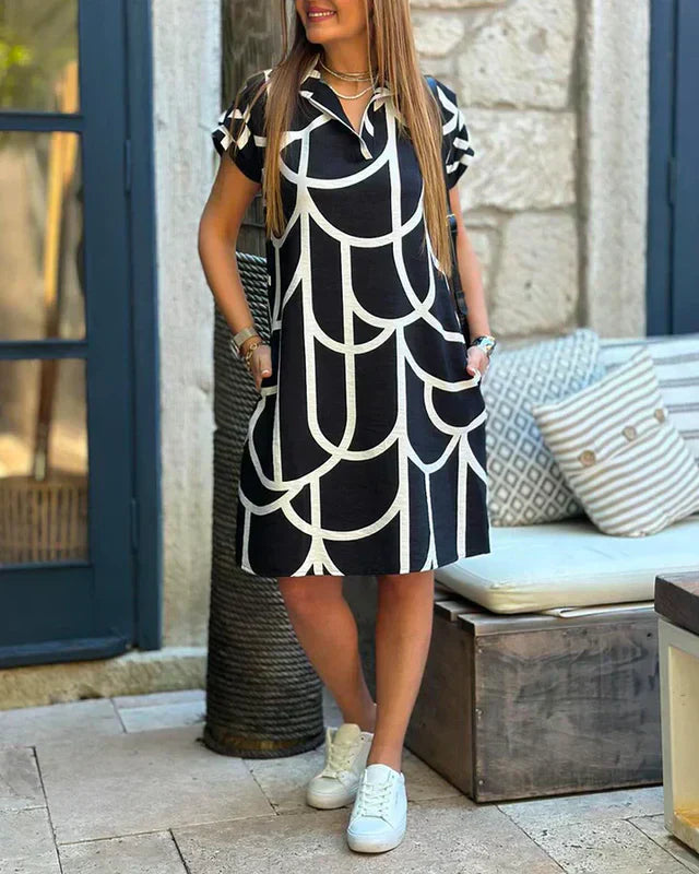 LP | Abito midi con stampa e maniche corte