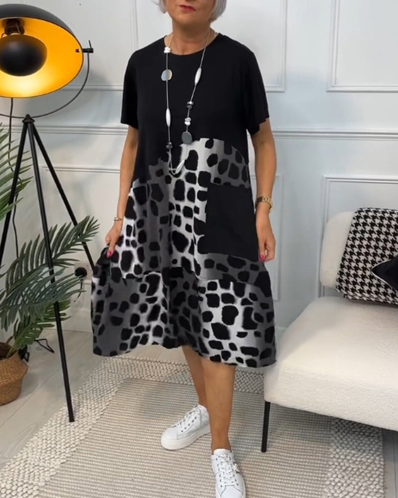 LP | Elegante abito midi a maniche corte con stampa leopardata