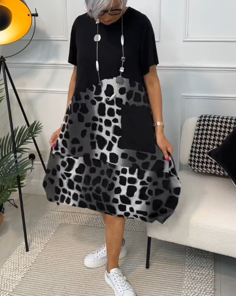 LP | Elegante abito midi a maniche corte con stampa leopardata