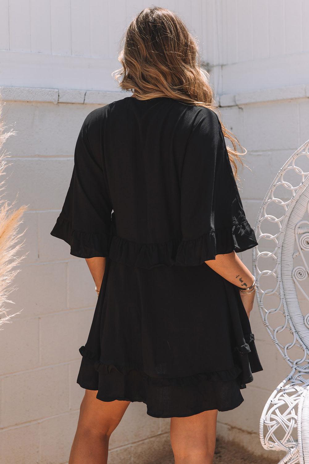 LP | Elegante mini abito babydoll nero con scollo a V