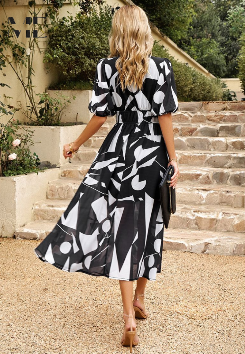 LP | Elegante abito midi floreale con maniche a sbuffo