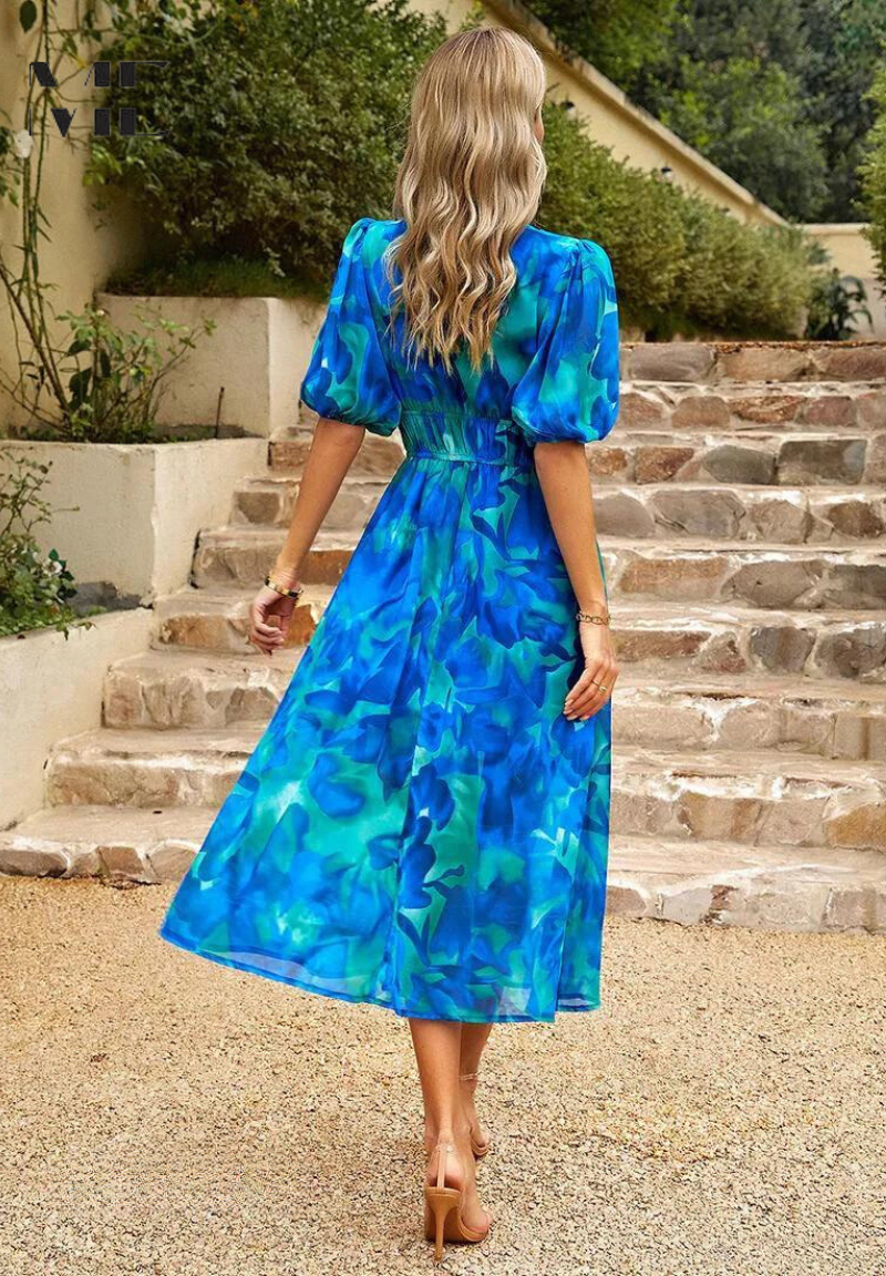 LP | Elegante abito midi floreale con maniche a sbuffo