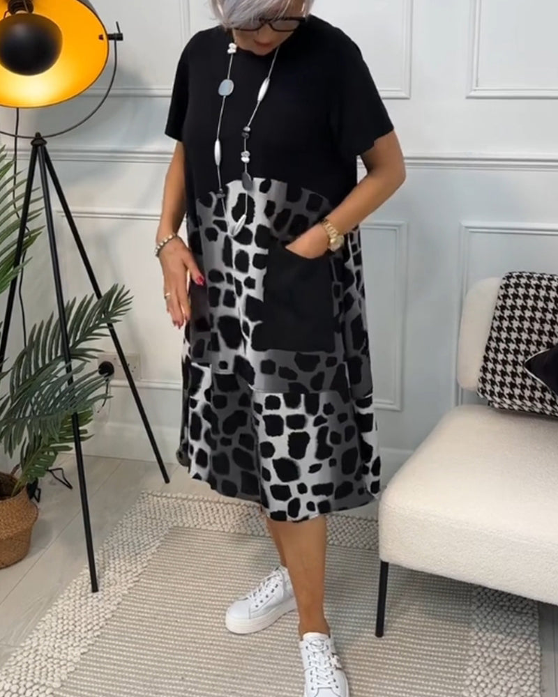 LP | Elegante abito midi a maniche corte con stampa leopardata