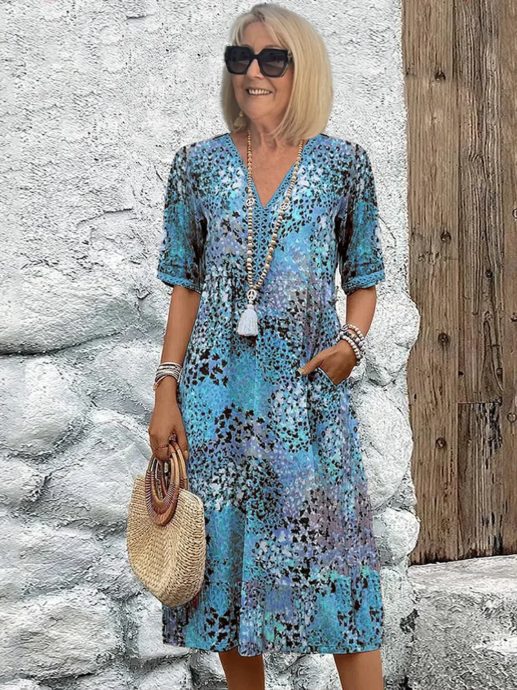 LP | Abito midi vibrante con tasche per donna
