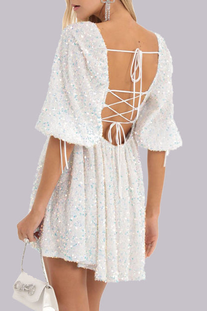 LP | Mini abito in paillettes con maniche a sbuffo