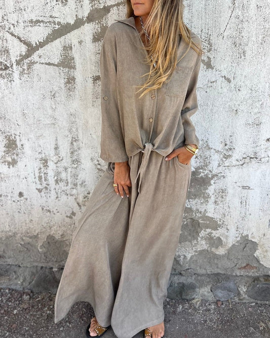 LP | Elegante outfit estivo da donna con pantaloni larghi e camicetta a maniche lunghe button-up