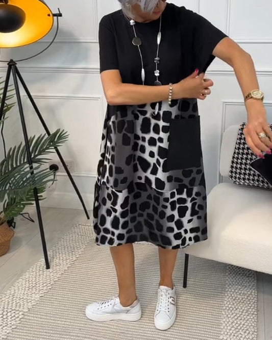LP | Elegante abito midi a maniche corte con stampa leopardata