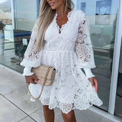 LP | Elegante abito midi in pizzo dalla linea ad A