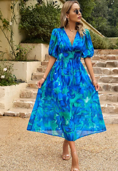 LP | Elegante abito midi floreale con maniche a sbuffo