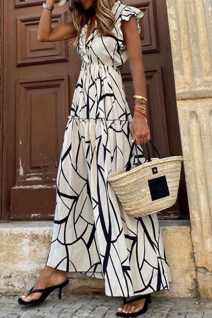 LP | Abito midi con scollo a V e volant con stampa geometrica