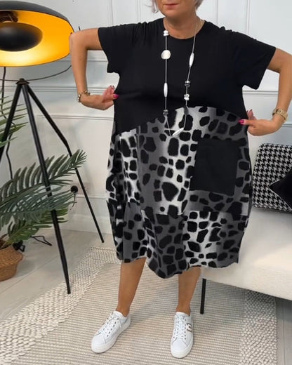 LP | Elegante abito midi a maniche corte con stampa leopardata