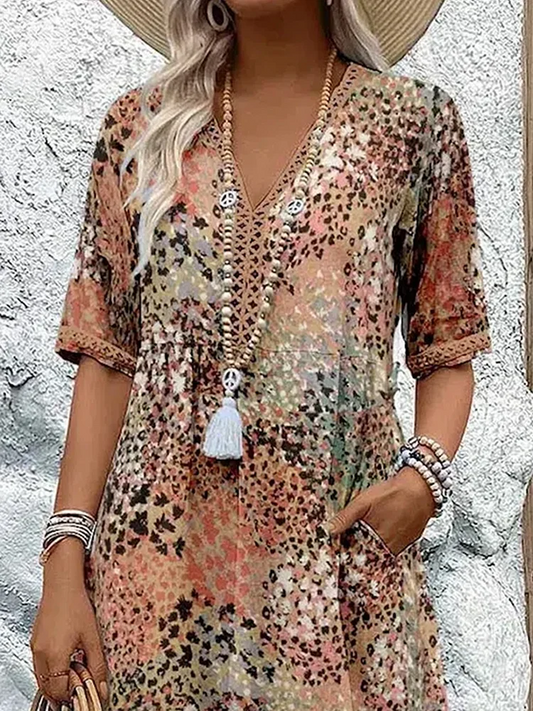 LP | Abito midi vibrante con tasche per donna