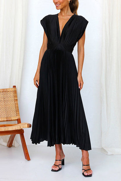LP | Maxi abito swing plissettato con profondo scollo a V